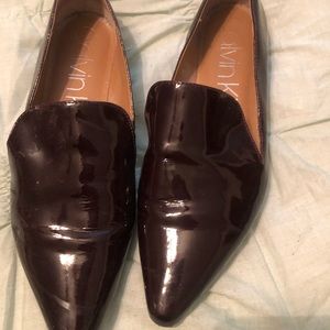 Dark red pointy flats